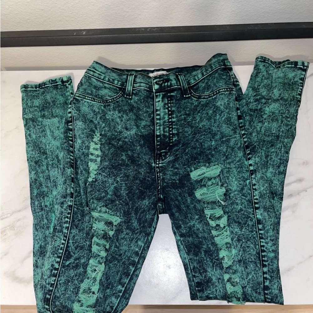 Green and black wash high waisted skinny jeans with rips from top to bottom